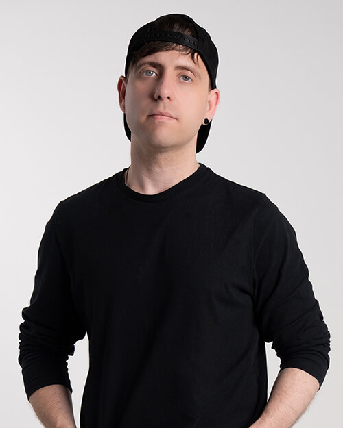 Lloyd standing and looking at camera